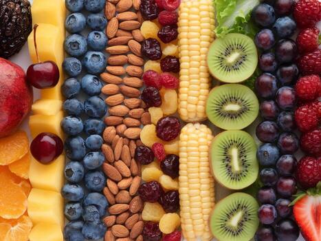 A colorful array of fresh fruits, nuts, and vegetables arranged beautifully in vibrant patterns. photo