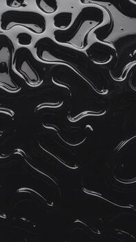 Abstract black texture with fluid shapes, creating a modern and artistic background. photo