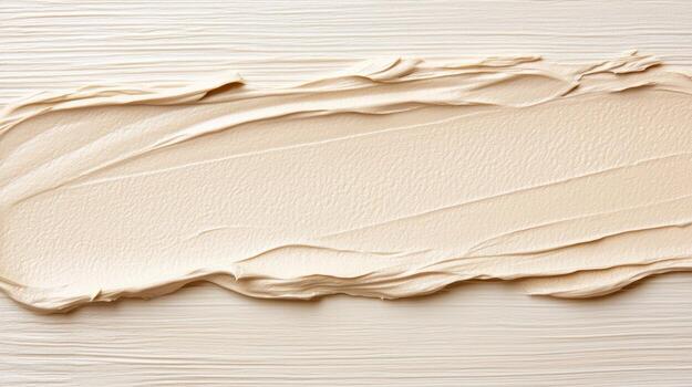 A cream texture on a white surface photo