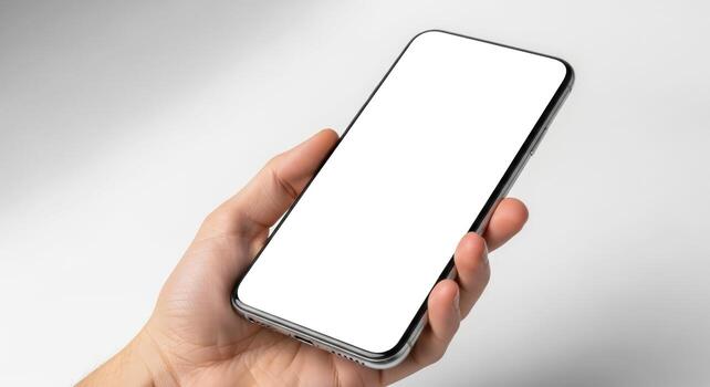 hand holding smartphone with blank screen, modern device mockup photo