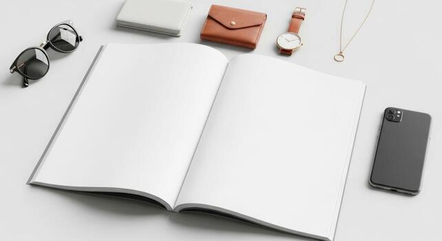 blank notebook mockup with accessories sunglasses, watch, phone, and wallet photo