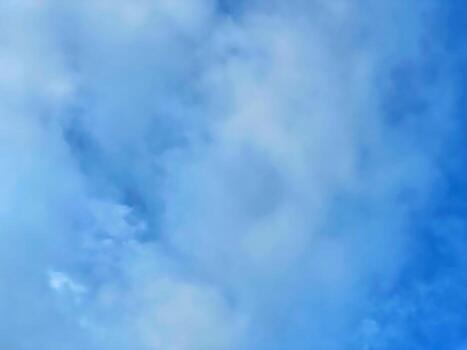 Abstract blue textures create a calming and serene atmosphere reminiscent of water or sky. photo