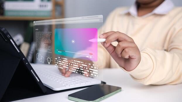 Online learning, education technology, innovation, and future digital interface in modern classroom. Boy using digital pen with holographic screen and tablet computer. photo