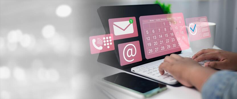 Remote work concept, Hands typing on tablet keyboard with digital icons of calendar, email, call, and checklist, representing online communication, remote work online, and task management. photo
