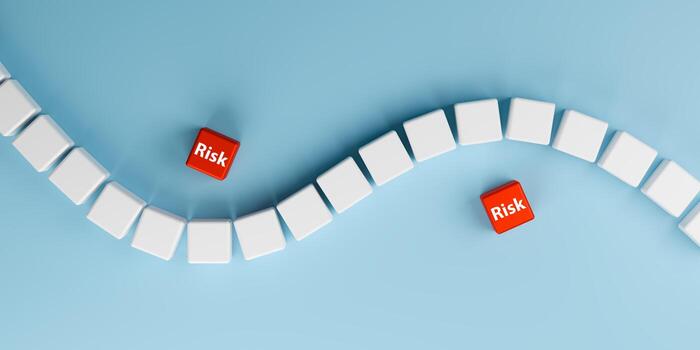 Business challenges, risk management, financial volatility, and strategic planning. 3d render. Abstract winding path of white blocks with two red blocks labeled RISK breaking the pattern. photo