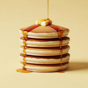 Stack of pancakes with syrup and butter photo