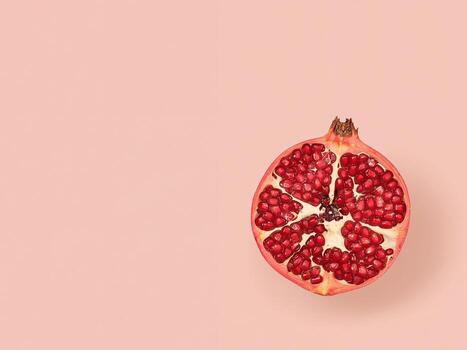 Slice of Freshness. A Ruby Red Gem on a Pastel Canvas, Simple and Appealing. photo