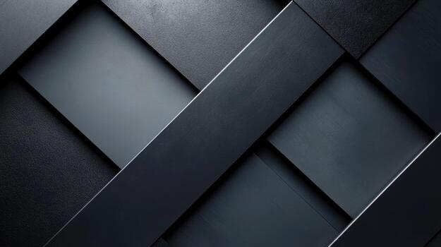 Intersecting planes and textural contrasts form a dynamic black and gray abstract composition photo