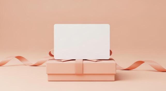 Peach gift box with blank white card and ribbon on soft background photo