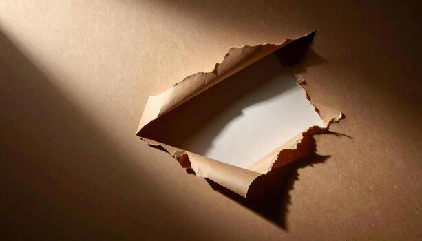 A hole in a wall with a piece of paper photo