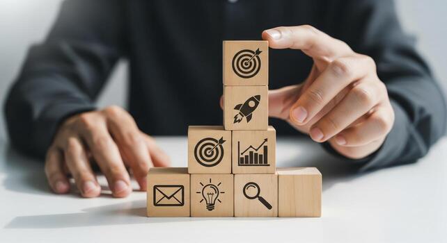 Business Strategy Icons On Wooden Blocks photo
