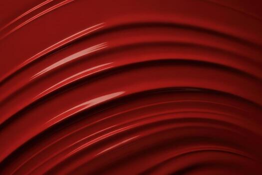 A red liquid flowing over a surface photo