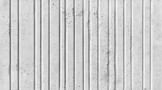 Textured concrete wall with vertical lines, grey tones, ideal for backgrounds. photo