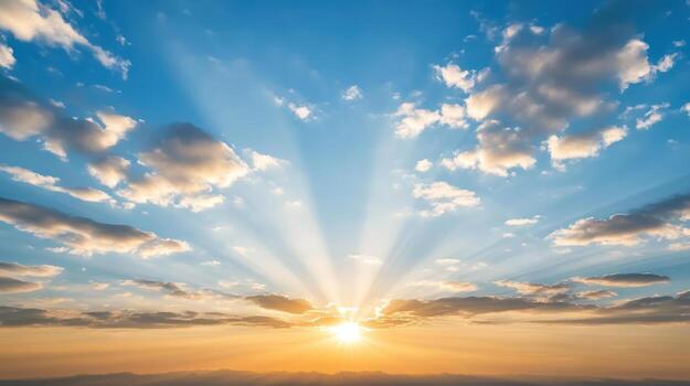 Sunset over the mountains with clouds and sun rays photo