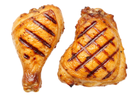 Two grilled chicken pieces isolated on transparent background png
