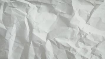 skrynkliga papper textur sluta rörelse grafisk. vit tom rynkig yta med kreativ handgjord stil animation. abstrakt bakgrund för konst, design, utbildning och presentation visuella video