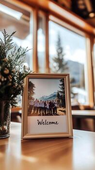 Team gathering welcome message displayed in a framed photo by the window in a cozy setting