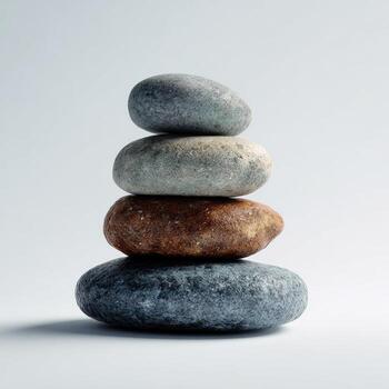 Smooth pebble stack balance meditation zen harmony tranquility natural stone minimal grayscale brown round photo