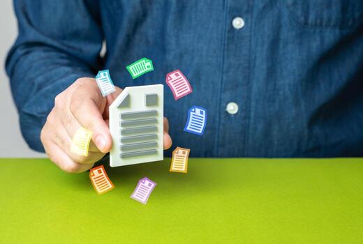 Document in hand. Single document reducing bureaucracy, simplified administration, faster approvals, digital workflow solutions. photo