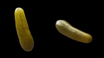 Cyclic rotation of two types of cucumbers around their axis. Alpha channel. video