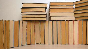 Folded old paper books. Library stacks of old books, bookstore. The concept of learning, reading and cognition, thirst for knowledge. the culture of reading video