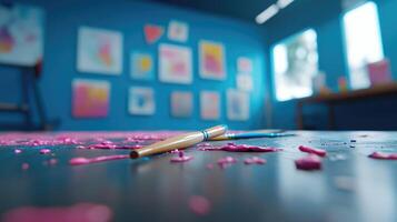 Art supplies messy paint splatters on a dark surface photo
