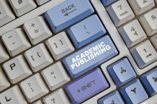 Academic publishing on the button keyboard photo