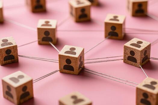 Connected wooden blocks, person icons, network photo