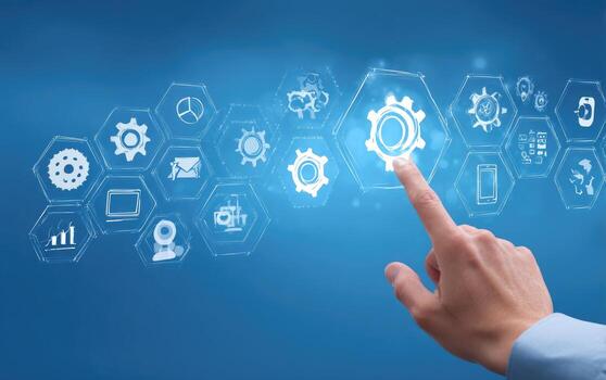 Hand touches digital gears, interconnected icons on a blue background photo