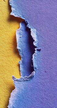 A piece of torn paper with a hole in it photo