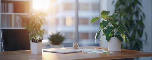Modern office workspace with natural light and greenery photo