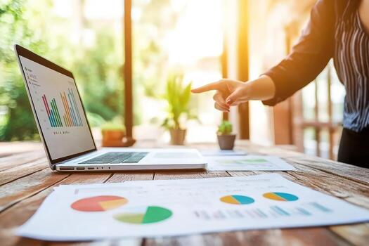 Business analytics data analysis and reporting with computer and graphs photo