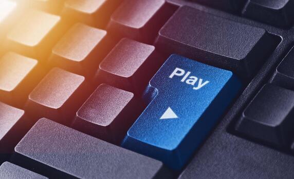 Play Button on Computer Keyboard Concept photo