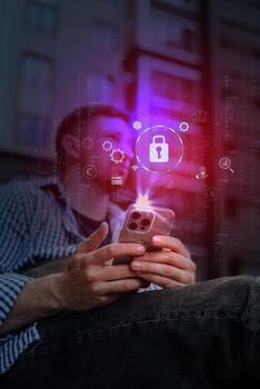 Exploring mobile security features in digital technology while sitting outdoors in an urban setting photo