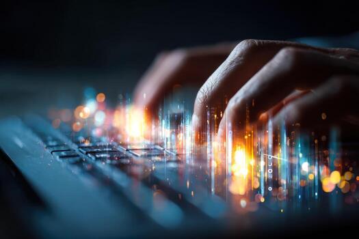 Close-up of hands typing on a keyboard with digital light effects and data visualization overlay photo