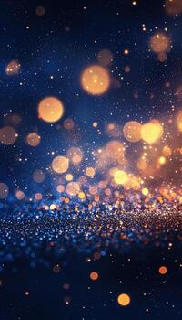 Glowing bokeh effect with golden and blue particles against dark background photo