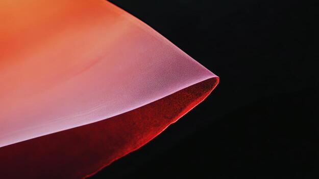 Vibrant abstract art showcasing smooth texture and rich color transition in a dark background photo