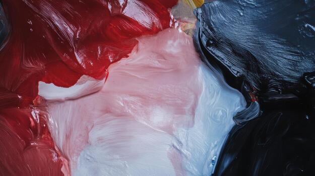 Colorful acrylic paint blending on canvas during an artistic creation process photo