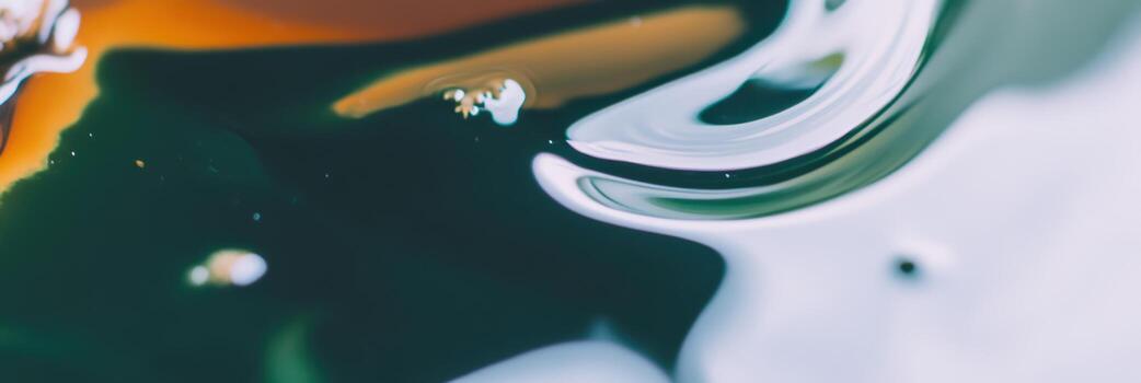 Abstract close-up of colorful liquid textures and patterns created by swirling water and light photo