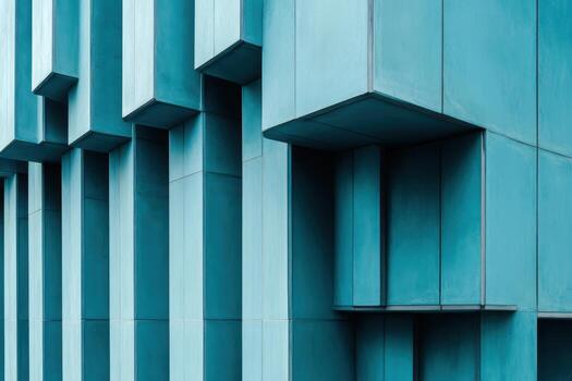 Modern geometric architectural design featuring textured blue panels in an urban setting photo