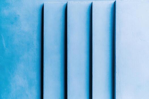 Blue textured wall with deep grooves creates a calming atmosphere in a modern space photo