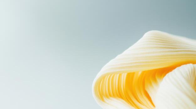 Delicate swirls of cream and yellow crafting a unique texture against a soft background photo