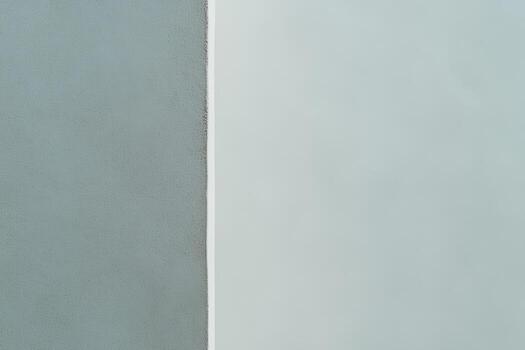 Neutral color wall divided by a textured vertical line in a contemporary design setting photo