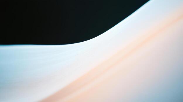 Smooth white fabric gently draped against a dark background creating a serene visual contrast photo