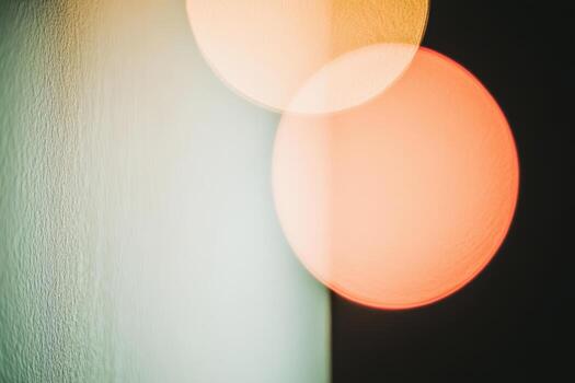 Abstract light patterns create a unique visual effect on a wall in a dimly lit space photo