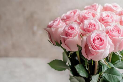 Pink roses arranged elegantly in a vase on a neutral background during daylight photo