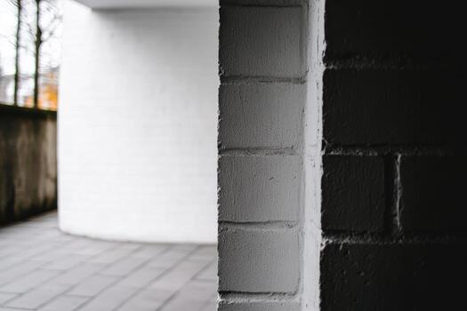 Contrasting textures of light and shadow in an urban setting with circular architecture photo