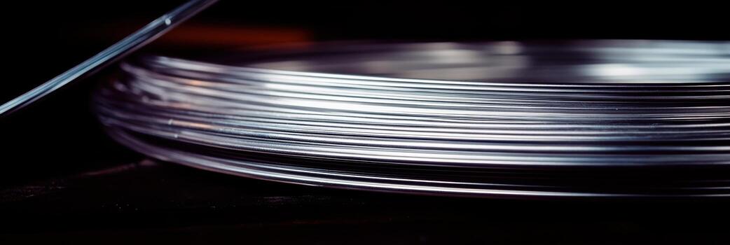 Thin transparent sheets arranged neatly on a dark surface in a creative workspace photo
