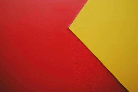 Bright red and yellow geometric shapes create a bold abstract background photo