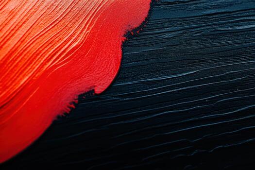 Bold red and black abstract painting showcases vibrant texture and color contrast photo